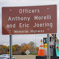 Photo of ODOT sign honoring Officers Morelli, Joering